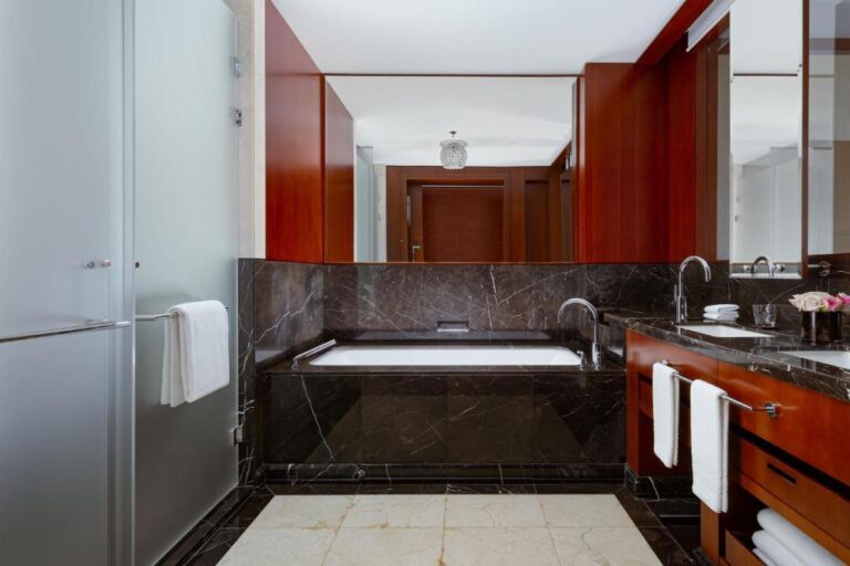 Bathroom of Deluxe room with city view in Ritz Carlton Almaty