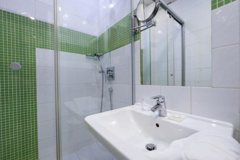 Bathroom of standard room in Kazzhol Hotel Almaty