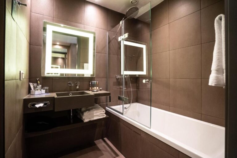 Bathroom of standard room in Novotel Almaty City Center