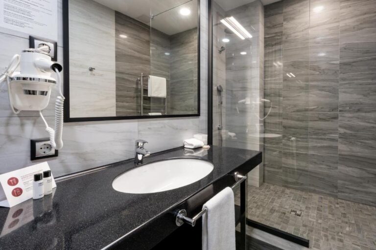 Bathroom of standard room in Reikartz Sky Almaty