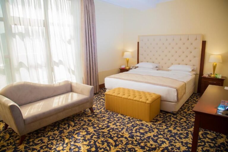 Bedroom of Aprtment in Ramada Almaty