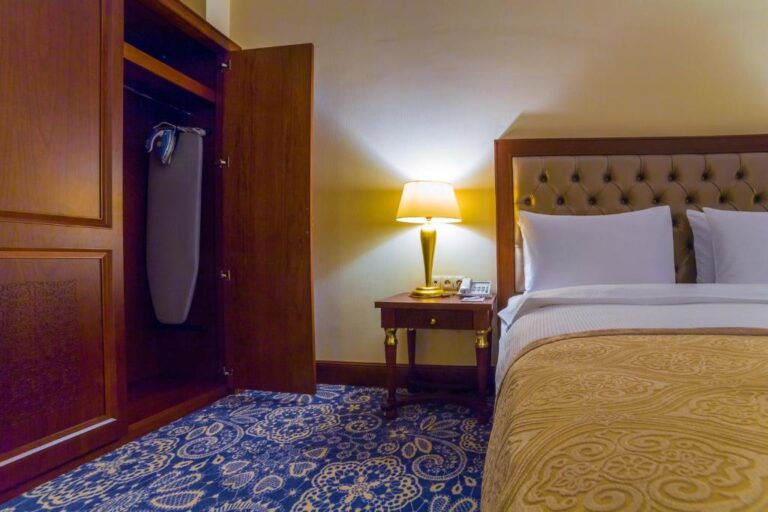 Bedroom of Business suite in Ramada Almaty