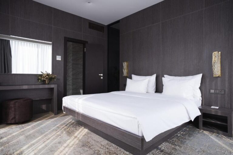 Bedroom of Deluxe suite in Resident city Hotel Almaty