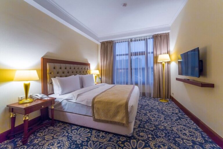 Bedroom of Executive City View in Ramada Almaty