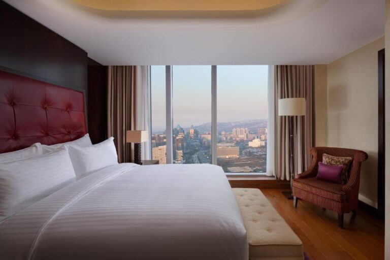 Bedroom of Executive Suite with city view in Ritz Carlton Almaty