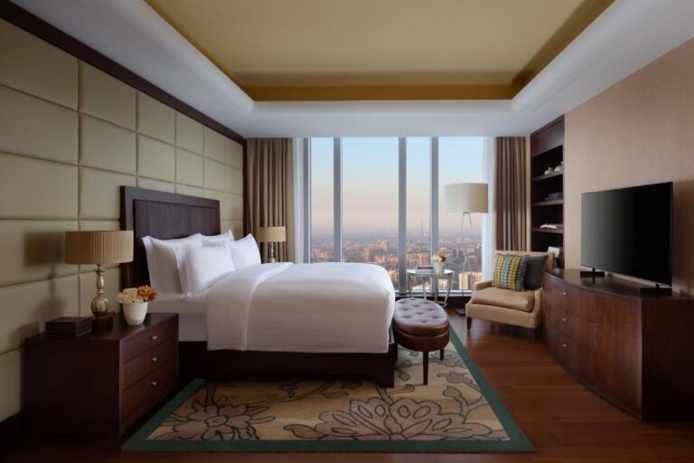 Bedroom of Grand Suite with city view in Ritz Carlton Almaty