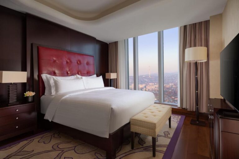 Bedroom of Junior Suite with city view in Ritz Carlton Almaty