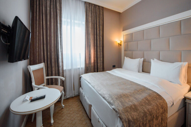 Bedroom of junior suite in Hotel Kazakhstan