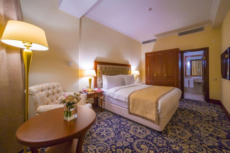 Bedroom of suite in Ramada Almaty