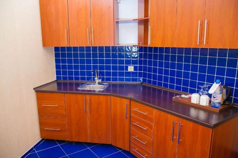 Kitchen of Aprtment in Ramada Almaty