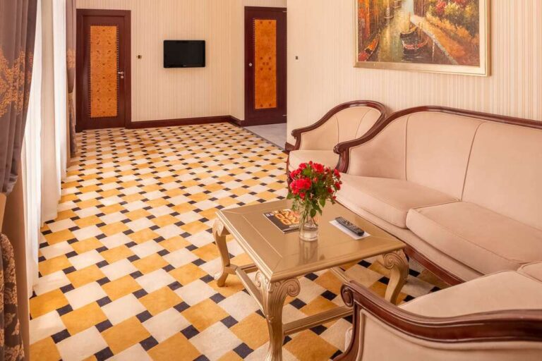 Living area of Suite in royal tulip Almaty
