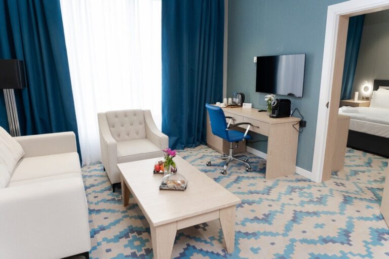 living room of Junior suite in park Dedeman Almaty